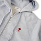 Hellblaue Sweatjacke mit kleinem roten " Ami de Coeur " Logo