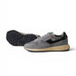 Grauer Autry-Sneaker mit schwarzen Details "Reelwind"