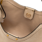 Sandfarbene Velour-Tasche
