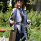 Blue/white striped blouse with green feather print