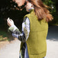 Green sweater vest