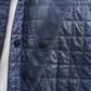 Tintenblaue, wattierte Coach-Jacke