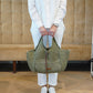 Olivefarbene Bast-Tasche