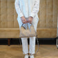 Sandfarbene Velour-Tasche