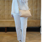 Puderfarbene Clutch