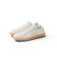 Cremefarbener Sneaker