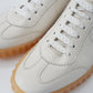 Cremefarbener Sneaker