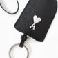Schwarzer Schlüsselanhänger mit kleinem silbernem " Ami de Cœur " Logo