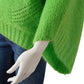 Grüner Poncho-Pullover