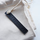 Sandfarbene, handgeflochtene Bast-Tasche mit schwarzen Leder Details