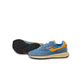 Azurblauer Autry-Sneaker mit orangenen Details "Reelwind"