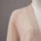 Powder-colored wool and cashmere cardigan