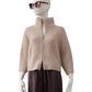 Puderfarbene Turtleneck-Strickjacke aus Wolle und Cashmere