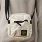 Sandfarbene Crossbody-Bag