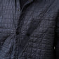 Tintenblaue, wattierte Coach-Jacke