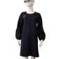 Dunkelblaues Jersey-Kleid mit Brosche
