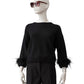 Schwarzer Cashmere-Pullover mit abnehmbaren Fransen