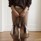 Creme/Haselnussfarbene Fell-Tasche
