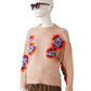 Puderfarbener Pullover mit Flower-Details