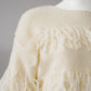 Cremefarbener Pullover mit Fransen