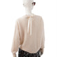 Cremefarbener Pullover mit Schleife