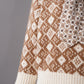Cream/camel-colored patterned sweater