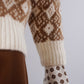 Cream/camel-colored patterned sweater