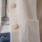 Cream-colored cardigan