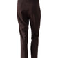 Dunkelbraune Hose mit goldenen Knöpfen