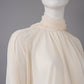 Cremefarbene Chiffon-Bluse mit Schluppe und Volantärmeln von Semicouture – Ansicht 4