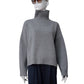 Grau melierter Rollkragenpullover aus Wolle