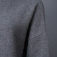 Grau melierter Rollkragenpullover aus Wolle