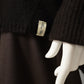 Espressobrauner Kaschmir-Pullover mit V-Ausschnitt und Lurex-Detail von Henry Christ – Detail von Saum und breitem Rippbündchen