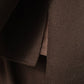 Dunkelbraune Kurzjacke aus gekochter Wolle von FFC – Detail des Ärmelsaums