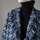 Blauer Bouclé-Mantel mit Fransenkanten