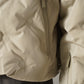 Greigefarbene Steppjacke mit Kapuze und Strickeinsatz