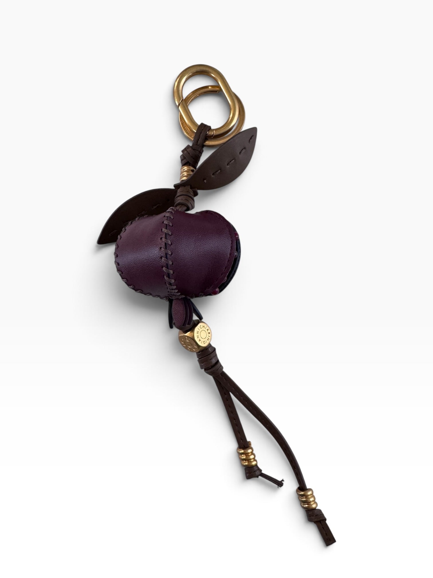 Bordeauxfarbener Taschenanhänger „Granatapfel“ von Gianni Chiarini