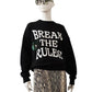 Schwarzes Sweatshirt mit Schriftzug "BREAK THE RULES"