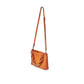 Kleine, orangefarbene Tasche mit Kettenriemen